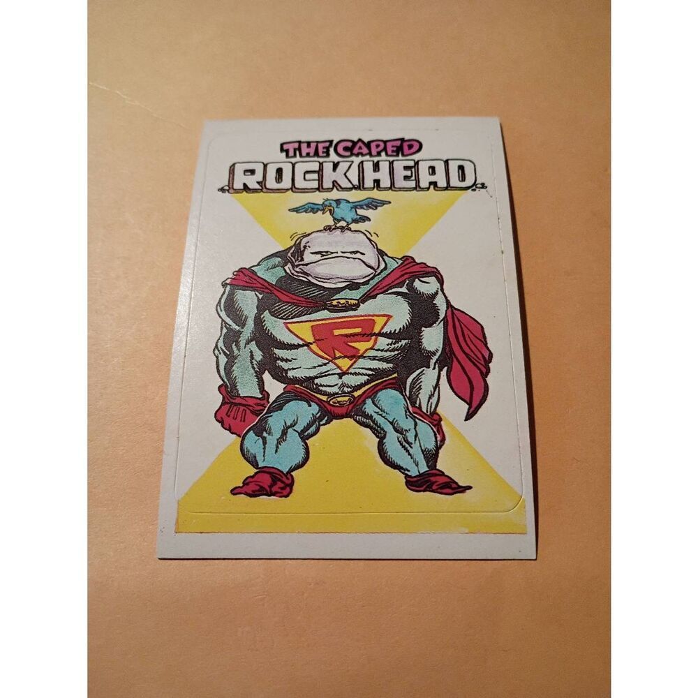 1983 General Mills Zero Hero Trading Card Sticker Vintage #63 Caped Rock Head